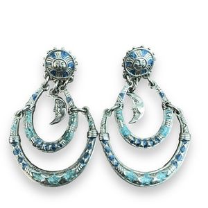 Silver and Blue Dangling Earrings with Sun and Moon Motif.